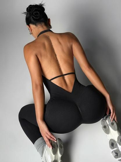 Sporty Jumpsuit with Wide Straps, Pockets, and High Stretch