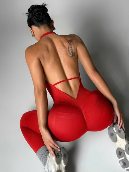 Sporty Jumpsuit with Wide Straps, Pockets, and High Stretch