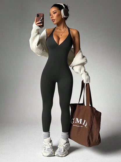 Sporty Jumpsuit with Wide Straps, Pockets, and High Stretch